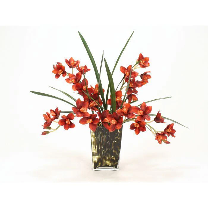 Waterlook® Rust Cymbidium Orchids with Foliage in Leopard-Spotted Glass Vase