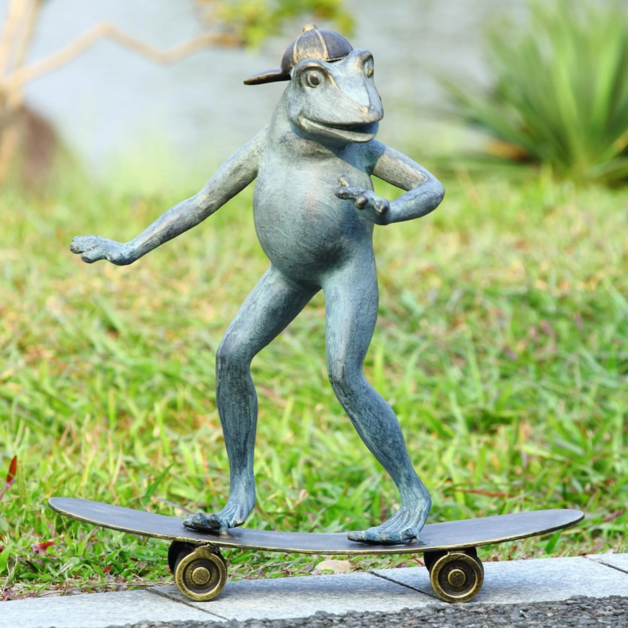 Radical Skateboarding Frog Sculpture