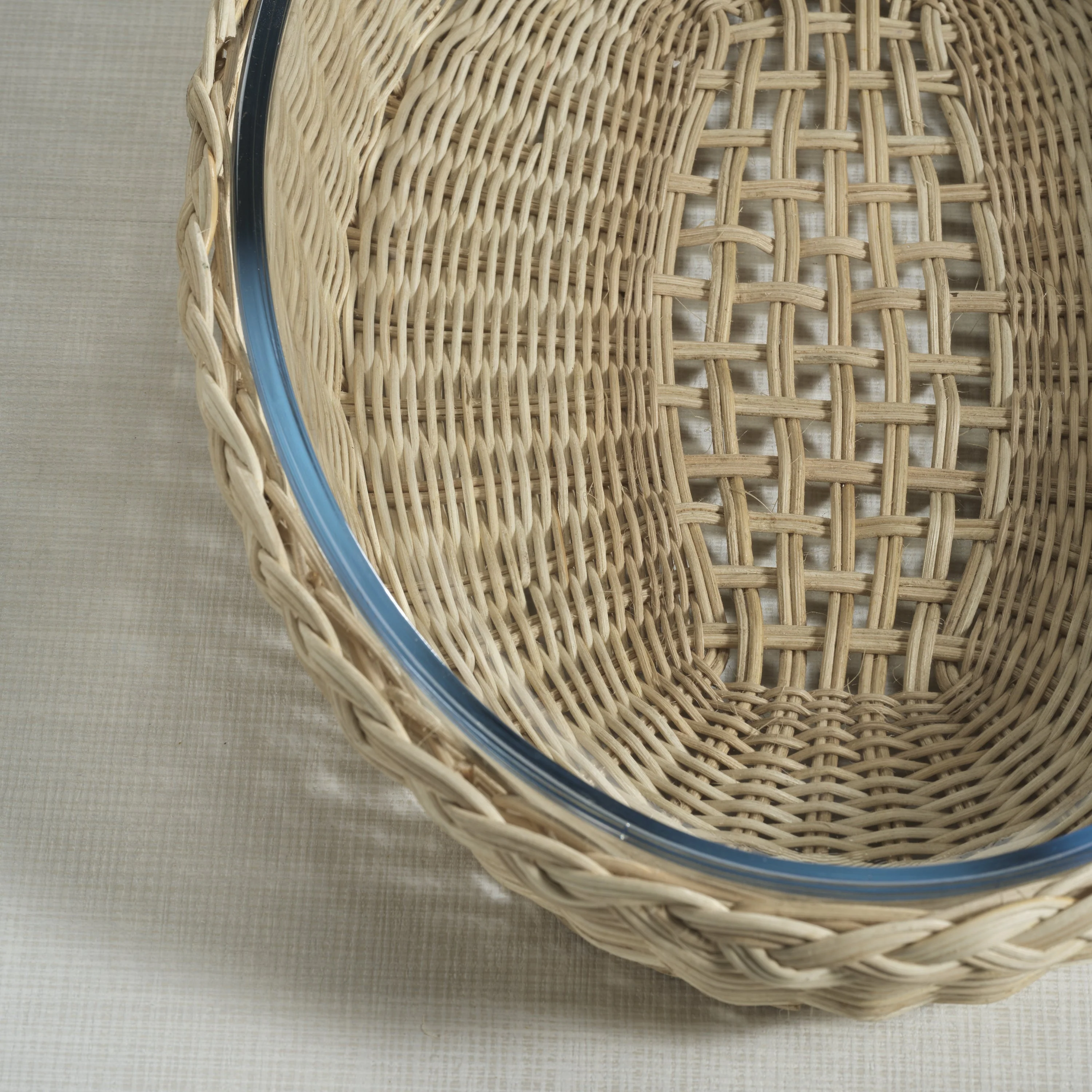 The Palmier Oval Glass Bowl in Woven Rattan Basket - Small - Image 4